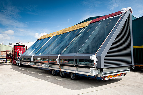 Loaded onto the wagon and ready to go. Two rooflights were moved in convoy with escort vehicles.