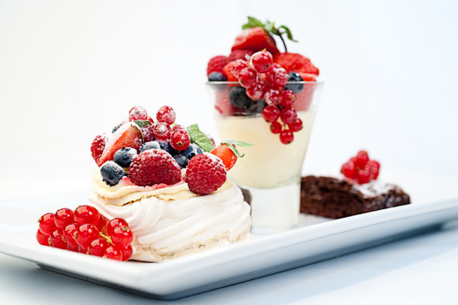 three part dessert with strawberrys and redcurrants