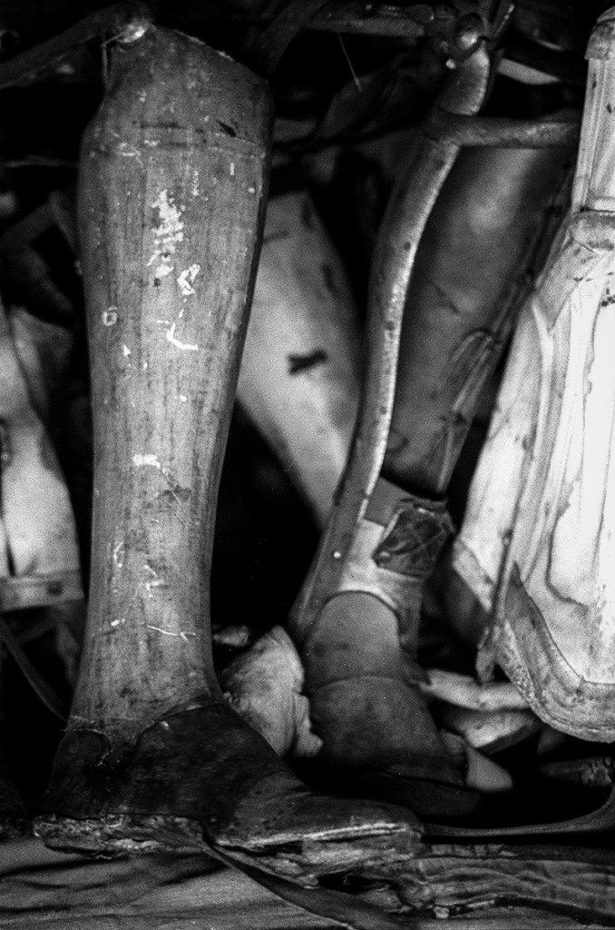 Some of the prosthetic limbs removed from Auschwitz inmates. Photo: © Michael Cockerham 1993.